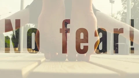 Face of a man doing headstand in the park Stock Footage