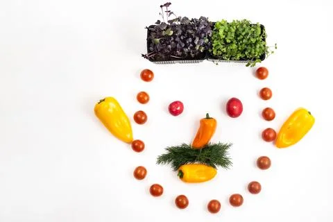The face of a man made of sliced vegetables on a white background Stock Photos