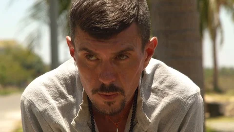 Face man practicing yoga pose close up. Portrait man meditating and exercising Video stock 90598904