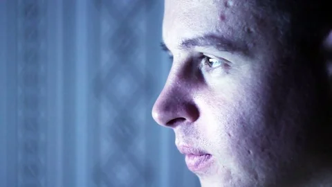 The face of man sitting at the computer Video stock 70632944