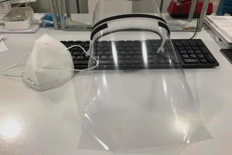 Face mask and face shield for Covid-19 Stock Photos