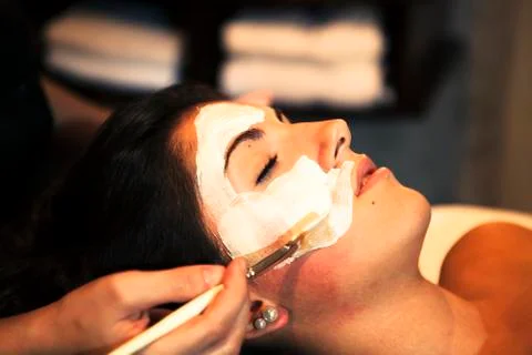 Face mask being applied during spa treatment. Stock Photos