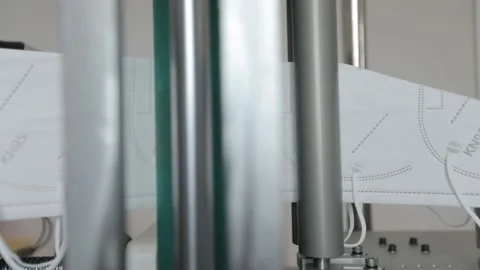 Face mask cutting process Stock Footage 138592494