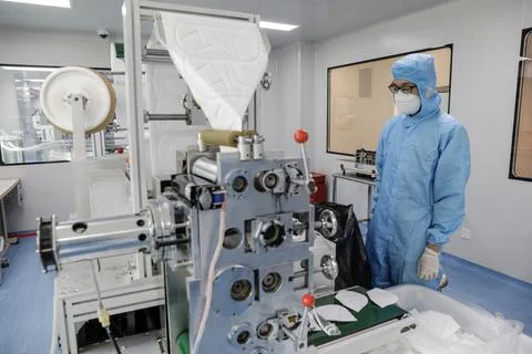 Face mask factory in Beijing, China - 29 Apr 2020 Stock Photos