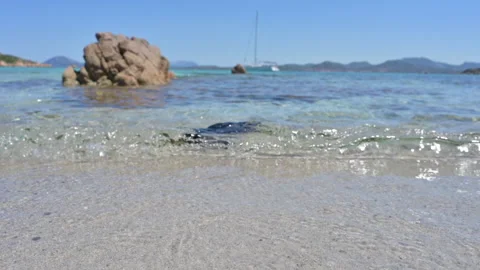 Face mask floating on crystal clear water in tropical sea Stock Footage 131644429