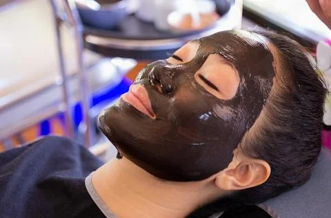Face mask with mud Stock Photos