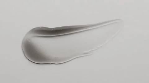 Face mask with particles. A sample of a cosmetic scrub for cleansing the skin Stock Footage 257565980