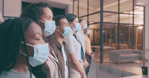 Face mask, queue and row of business people by building for protection, hygiene Video stock 262160793