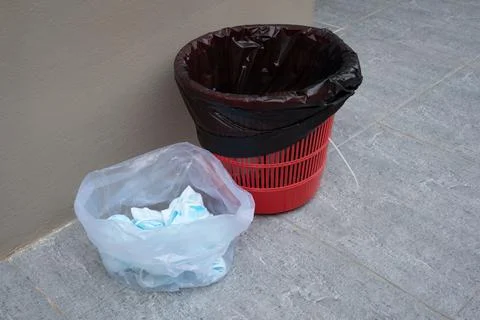 Face mask trash separated from general trash Stock Photos
