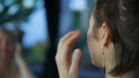 Face massage. Beaming appealing blonde-haired woman with doing face massage. Stock-Footage 102162494