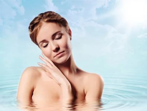 Face massage isolated on blue Stock Photos