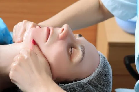 Face massage Stock Photos