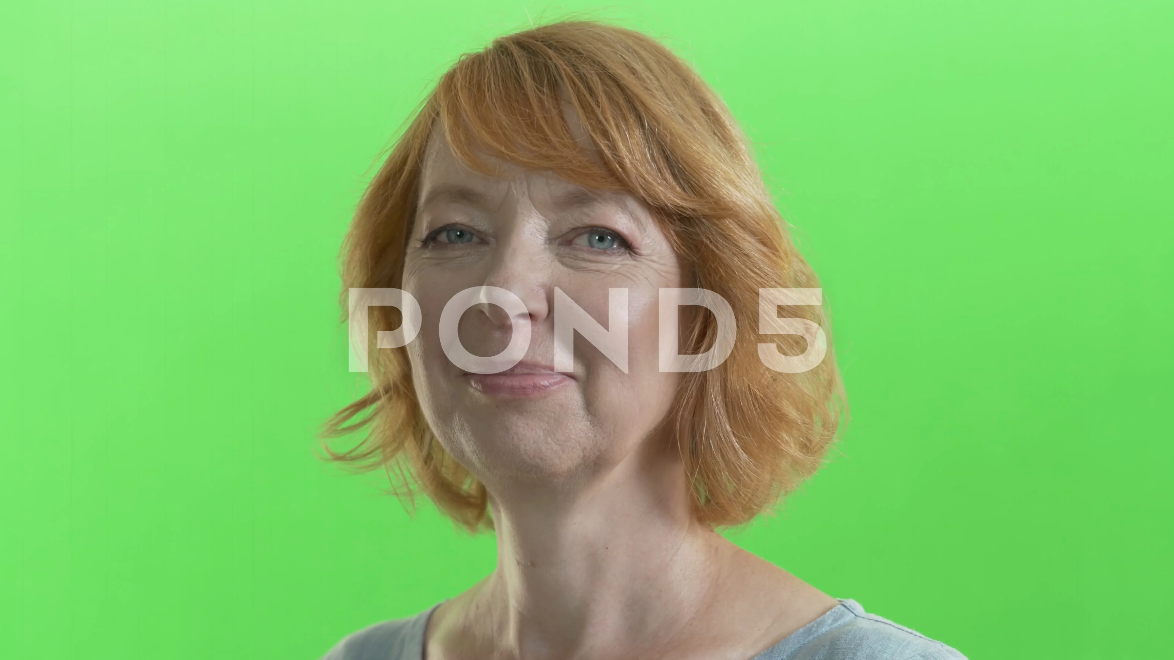 Face of mature ginger red hair women smiling to camera. Close up Green  Screen 4K