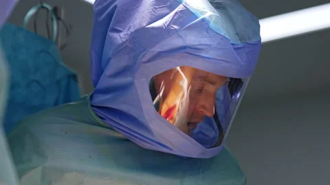 Face of a medic concentrated on operation. Stock Footage 241124091
