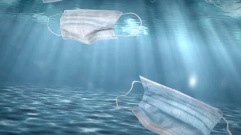 Face medical masks sinking underwater and polluting Stock Footage
