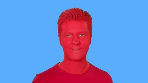 The face of men painted with red paint Video stock 107848910