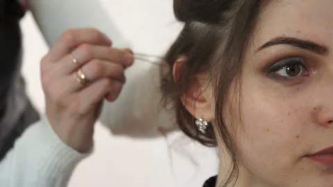 Face model close-up at the stylist Stock Footage 109365691