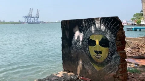 Face Mural Painted On A Crumbling Wall, Fort Kochi, India - 26 Apr 2019 Stock Footage 296775999