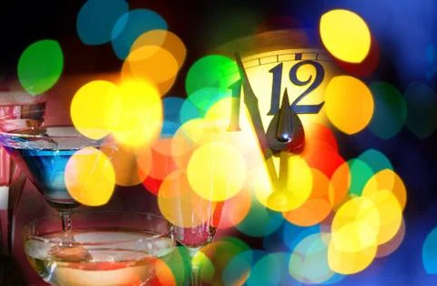 Face of new year clock with colored decoration Stock Photos