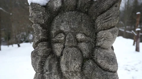 The face of an old, authentic Slavic idol in Ukraine in winter Stock Footage 234922509