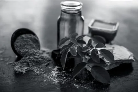 Face pack of devil's dung powder on wooden surface i.e. Hing powder well mixe Stock Photos