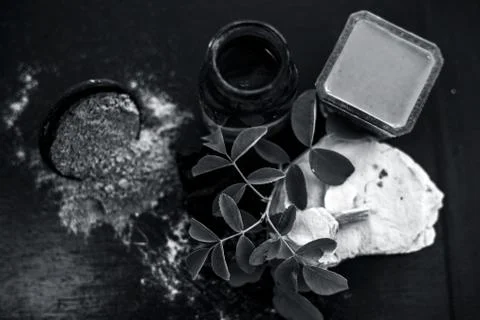 Face pack of devil's dung powder on wooden surface i.e. Hing powder well mixe Stock Photos