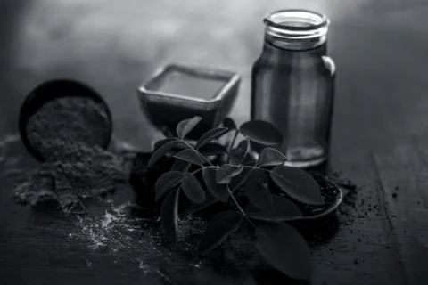 Face pack of devil's dung powder on wooden surface i.e. Hing powder well mixe Stock Photos