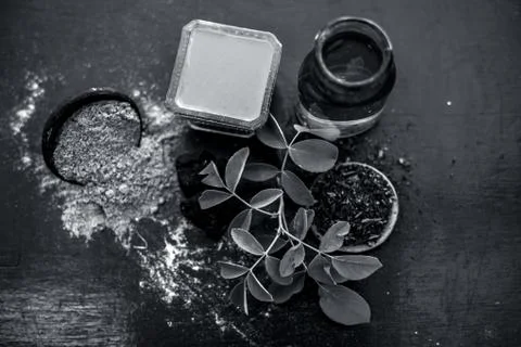 Face pack of devil's dung powder on wooden surface i.e. Hing powder well mixe Stock Photos