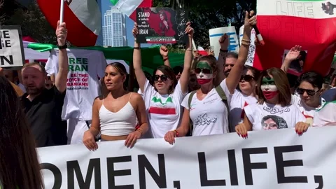 Face painted protesters March in Los Angeles to call for Freedom in Iran 動画素材 216173640