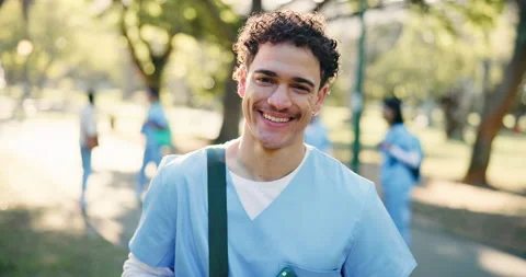 Face, park and happy man for medical internship, scholarship or residence in Stock Footage 346115937
