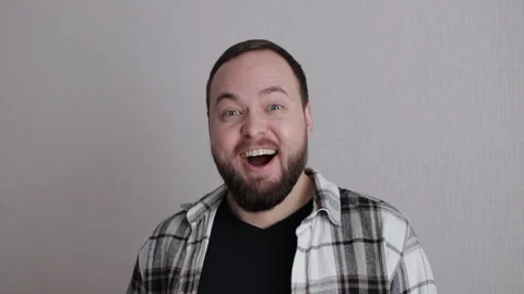 Face portrait of excited, comic and funny man happy with comedy Stock Footage 300855974