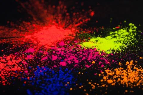 Face powder on a black background, abstract Stock Photos