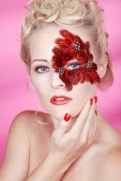 Face with red feathers Stock-Fotos