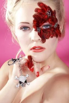 Face with red feathers Stock-Fotos