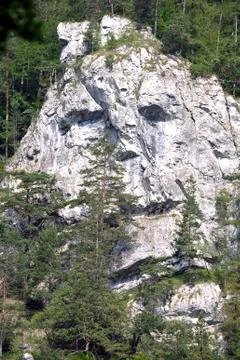 Face in rock Stock Photos
