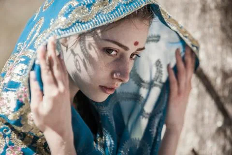 Face, sari and shadows Stock Photos