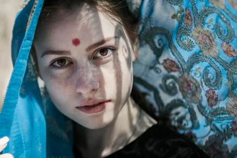 Face, sari and shadows Stock Photos