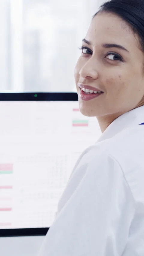 Face, scientist and reading with computer in lab for career pride, about us and Stock Footage 329664575