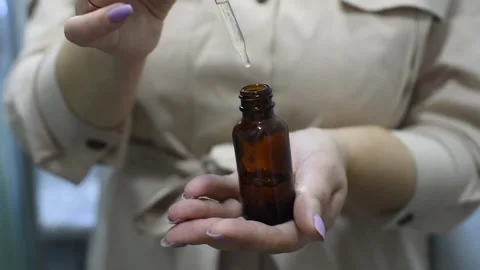 Face serum drops Stock Footage 165333181