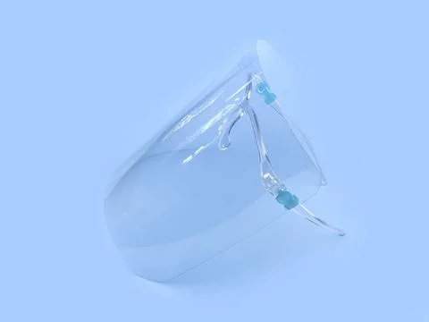 Face shield or protective isolation mask on a blue background. Foto stock