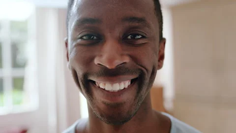 Face, smile and black man in living room with peace, positive attitude and rest Stock Footage 335801639