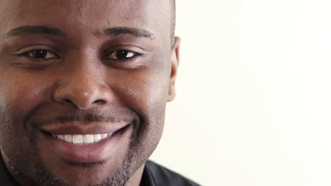 Face, smile and teeth of black man on studio space for dental health or hygiene Stock Footage 336650829