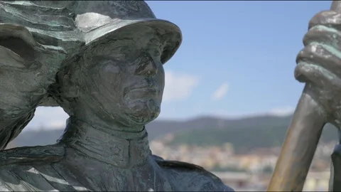 Face of a statue with a panel behind it Stock Footage 76951328