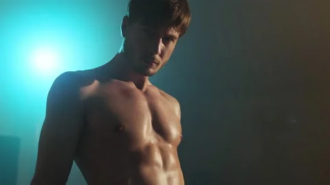 Face Of Strong Boxer In Dark Ring. Young Man Standing With Naked Torso. Piercing Stock Footage 160767961