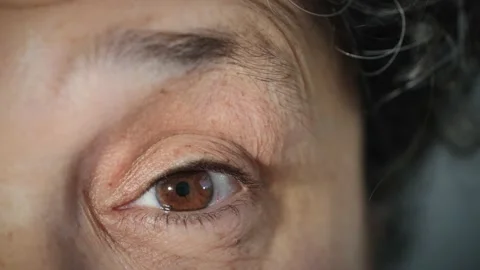 Face of surprised or shocked old Arab woman with brown eye raising eyebrow. Stock Footage 167525172