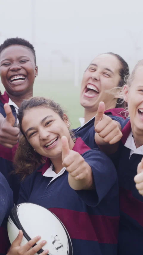 Face, team and thumbs up on field with sports practice, smile or accomplishment Stock Footage 334900428