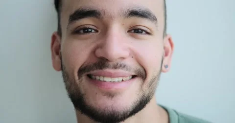 Face of thoughtful man smiling Stock Footage 156469515