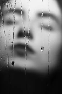 Face through drops Photos