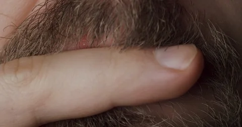 Face touch - coronavirus concept. Man touching his mouth.  COVID-19 risk Video stock 127377466