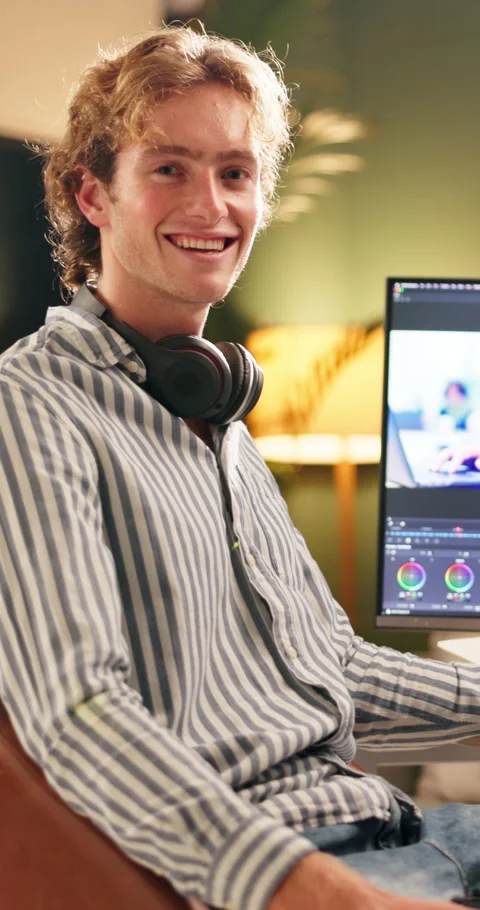 Face, video editor and man in home, smile and process for content creation, Stock Footage 327787513